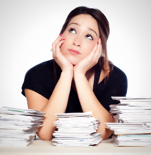 Woman thinking about how to organize her financial records